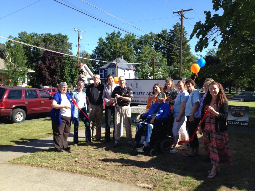 A picture of the The DAC North West Board Members gathered together outside of one of the DAC Northwest branches